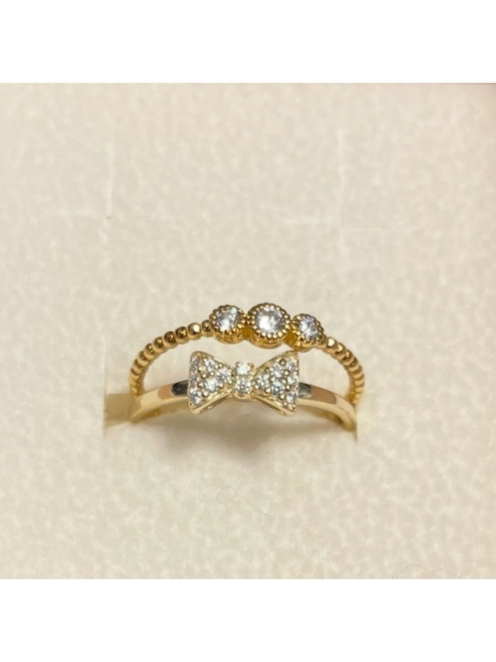 14k gold plating on sterling silver (Gold Vermeil) CZ Bow and Bezel rings size 6